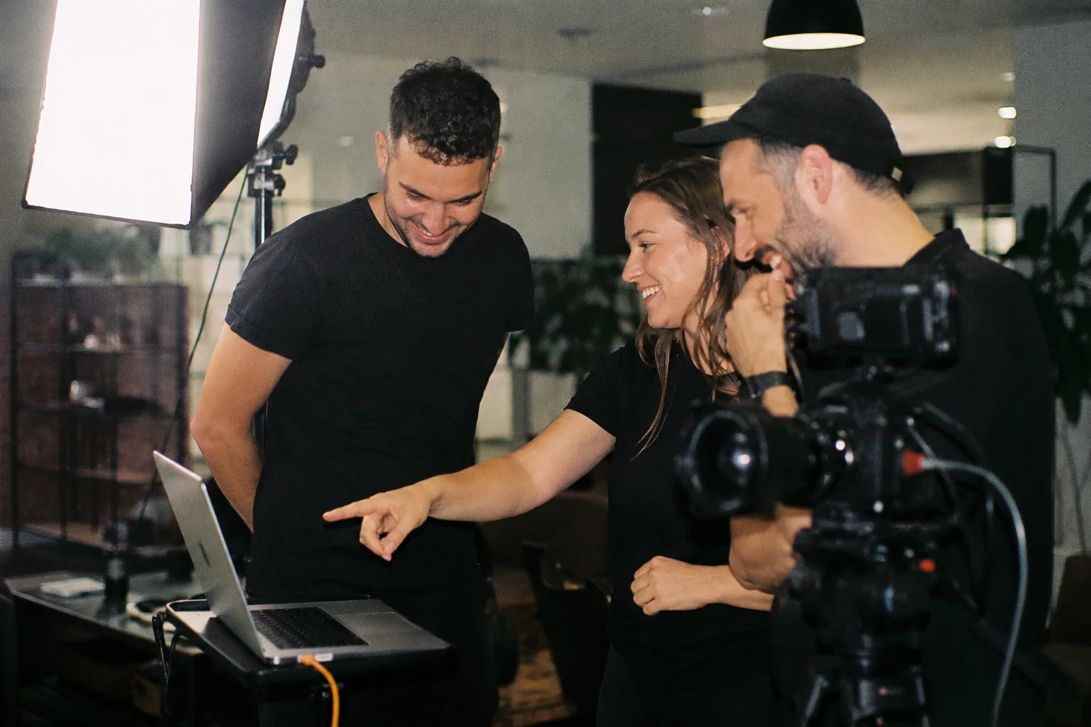 The Proovn crew reviewing a customer shoot together